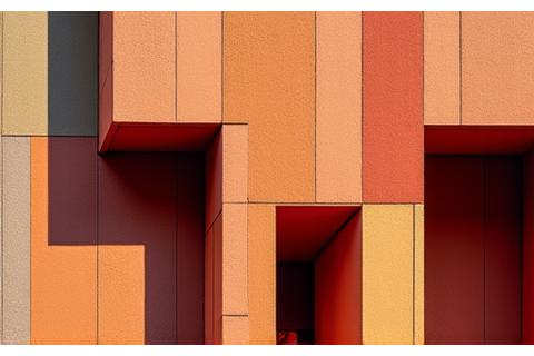 Photo d'une façade architecturale moderne colorée avec des ocres